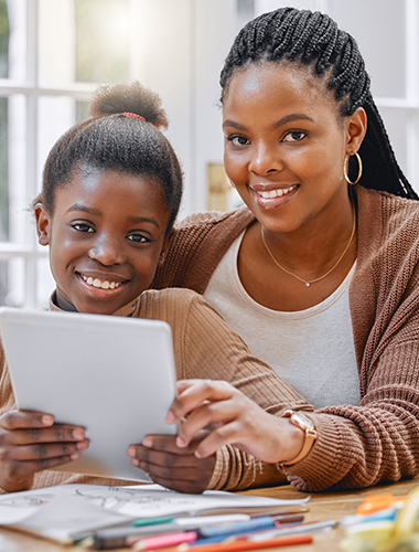 everything we need is on this tablet. shot of a young mother and